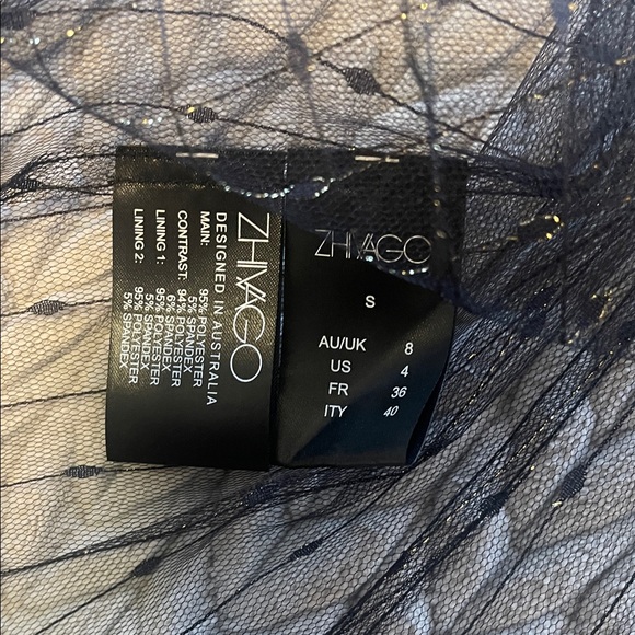 Zhivago Sheer Black Mesh Zip-Up Blouse with Puffed Shoulders - Picture 5 of 6